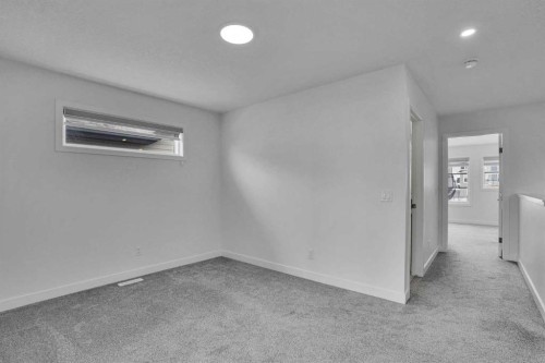 26 Amblehurst Path Nw, Calgary, AB - Indoor Photo Showing Other Room