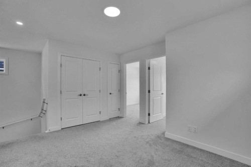 26 Amblehurst Path Nw, Calgary, AB - Indoor Photo Showing Other Room
