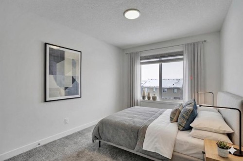 26 Amblehurst Path Nw, Calgary, AB - Indoor Photo Showing Bedroom