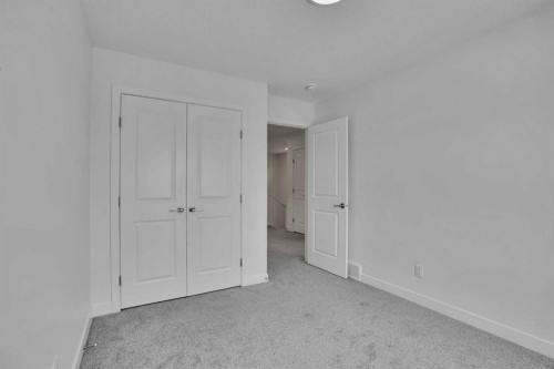 26 Amblehurst Path Nw, Calgary, AB - Indoor Photo Showing Other Room