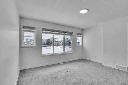 26 Amblehurst Path Nw, Calgary, AB - Indoor Photo Showing Other Room