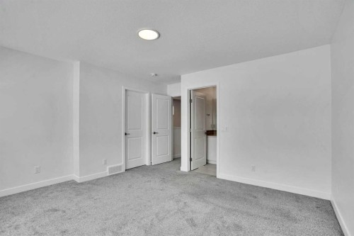 26 Amblehurst Path Nw, Calgary, AB - Indoor Photo Showing Other Room