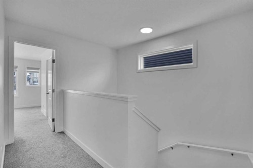 26 Amblehurst Path Nw, Calgary, AB - Indoor Photo Showing Other Room