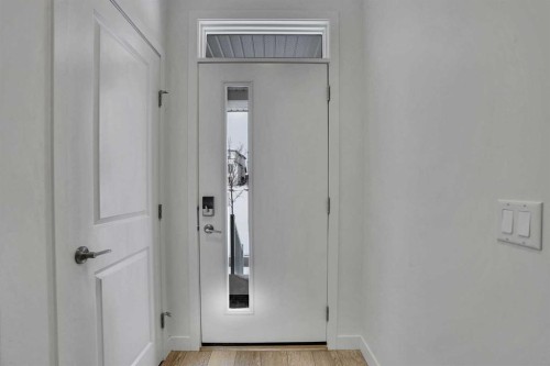 26 Amblehurst Path Nw, Calgary, AB - Indoor Photo Showing Other Room