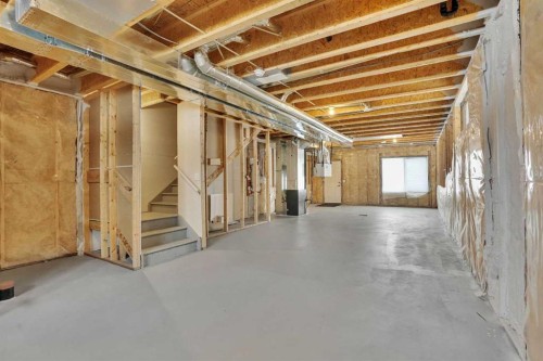 26 Amblehurst Path Nw, Calgary, AB - Indoor Photo Showing Basement