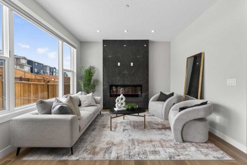 31 Herron Rise Ne, Calgary, AB - Indoor Photo Showing Living Room With Fireplace