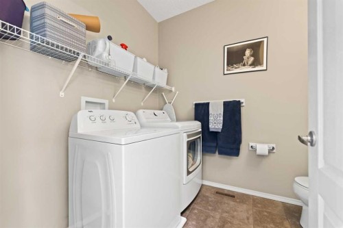 159 Evansborough Crescent Nw, Calgary, AB - Indoor Photo Showing Laundry Room