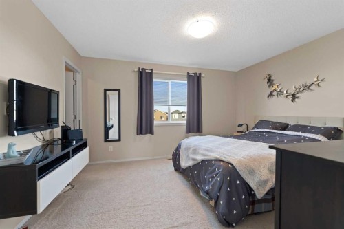 159 Evansborough Crescent Nw, Calgary, AB - Indoor Photo Showing Bedroom