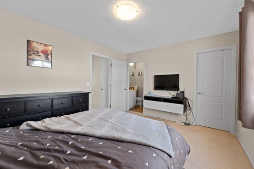 159 Evansborough Crescent Nw, Calgary, AB - Indoor Photo Showing Bedroom