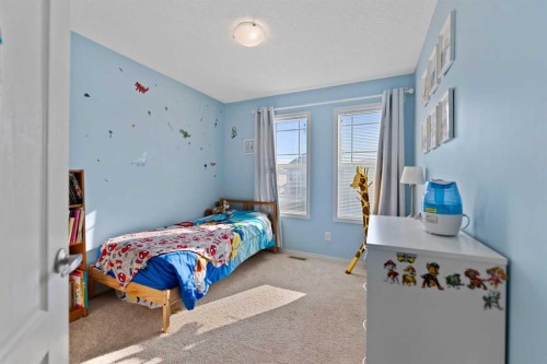 159 Evansborough Crescent Nw, Calgary, AB - Indoor Photo Showing Bedroom