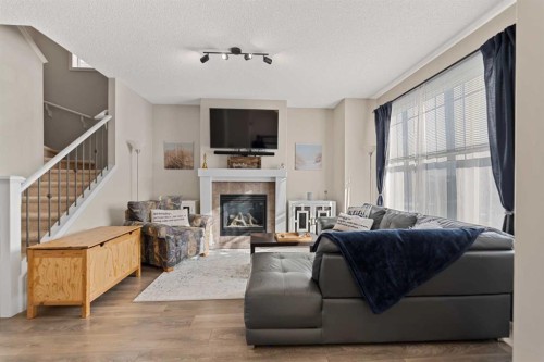 159 Evansborough Crescent Nw, Calgary, AB - Indoor Photo Showing Living Room With Fireplace