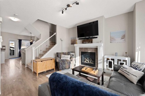 159 Evansborough Crescent Nw, Calgary, AB - Indoor Photo Showing Living Room With Fireplace