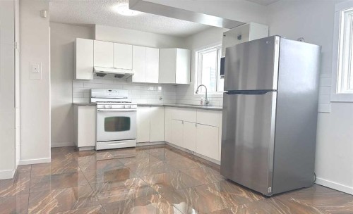 3229 19 Avenue Se, Calgary, AB - Indoor Photo Showing Kitchen