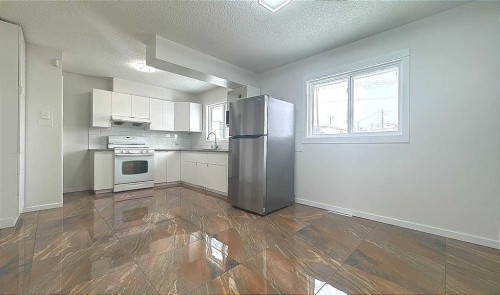 3229 19 Avenue Se, Calgary, AB - Indoor Photo Showing Kitchen