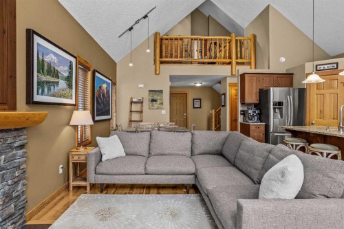 1112 Wilson Way, Canmore, AB - Indoor Photo Showing Living Room