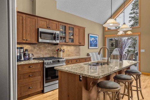1112 Wilson Way, Canmore, AB - Indoor Photo Showing Kitchen With Double Sink With Upgraded Kitchen