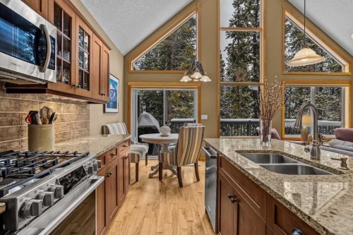 1112 Wilson Way, Canmore, AB - Indoor Photo Showing Kitchen With Double Sink