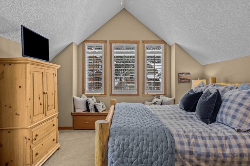 1112 Wilson Way, Canmore, AB - Indoor Photo Showing Bedroom