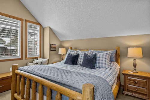 1112 Wilson Way, Canmore, AB - Indoor Photo Showing Bedroom