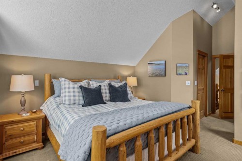 1112 Wilson Way, Canmore, AB - Indoor Photo Showing Bedroom