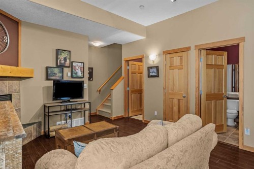 1112 Wilson Way, Canmore, AB - Indoor With Fireplace