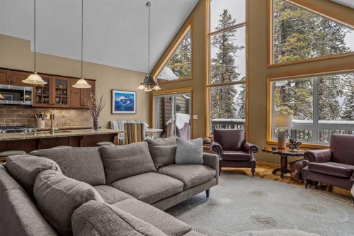 1112 Wilson Way, Canmore, AB - Indoor Photo Showing Living Room
