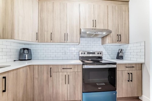 127 Saddlecrest Grove Ne, Calgary, AB - Indoor Photo Showing Kitchen