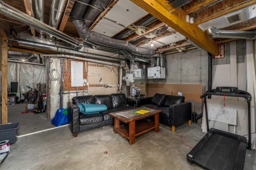 313 Hillcrest Road Sw, Airdrie, AB - Indoor Photo Showing Basement
