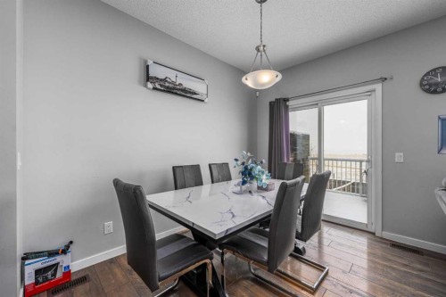 313 Hillcrest Road Sw, Airdrie, AB - Indoor Photo Showing Dining Room