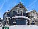 47 Sundown Crescent, Cochrane, AB  - Outdoor With Facade 