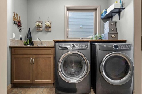 25 Tuscany Summit Terrace Nw, Calgary, AB - Indoor Photo Showing Laundry Room