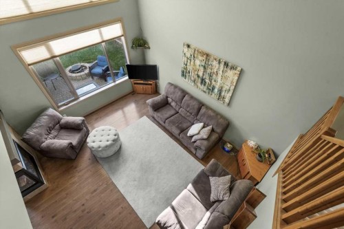 25 Tuscany Summit Terrace Nw, Calgary, AB - Indoor Photo Showing Living Room