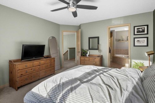25 Tuscany Summit Terrace Nw, Calgary, AB - Indoor Photo Showing Bedroom
