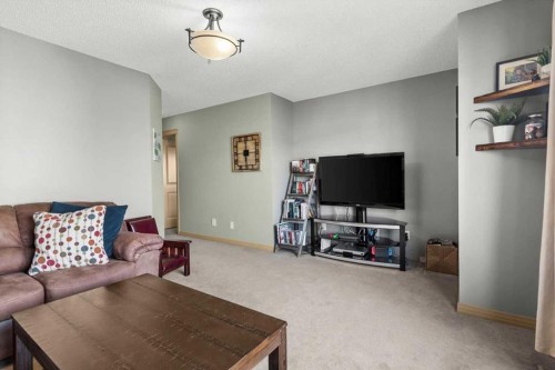 25 Tuscany Summit Terrace Nw, Calgary, AB - Indoor Photo Showing Living Room