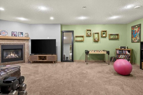 25 Tuscany Summit Terrace Nw, Calgary, AB - Indoor With Fireplace