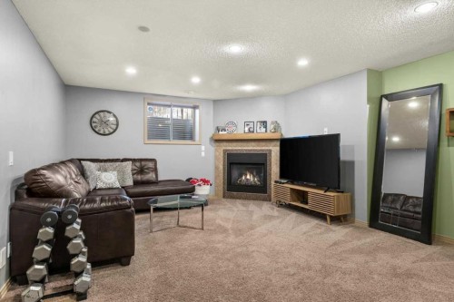 25 Tuscany Summit Terrace Nw, Calgary, AB - Indoor With Fireplace