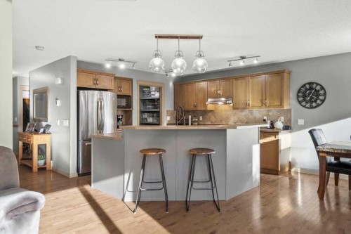 25 Tuscany Summit Terrace Nw, Calgary, AB - Indoor Photo Showing Kitchen With Upgraded Kitchen