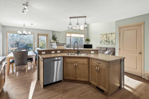 25 Tuscany Summit Terrace Nw, Calgary, AB - Indoor Photo Showing Kitchen With Double Sink