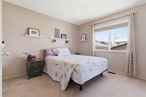 90 Cranberry Square, Calgary, AB - Indoor Photo Showing Bedroom