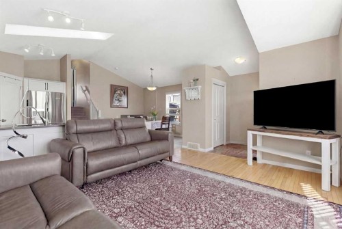 90 Cranberry Square, Calgary, AB - Indoor Photo Showing Living Room