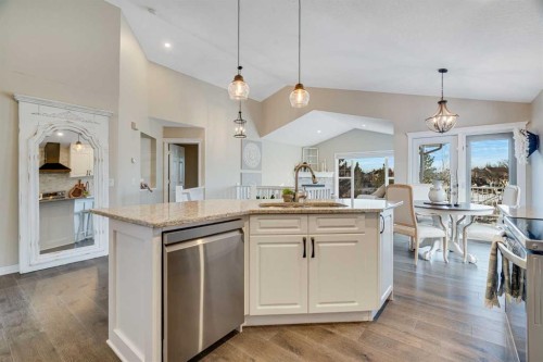 701 Cimarron Close, Okotoks, AB - Indoor Photo Showing Kitchen With Upgraded Kitchen