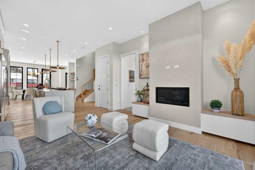 416 36 Street Sw, Calgary, AB - Indoor Photo Showing Living Room With Fireplace