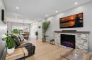 288 Copperstone Gardens Se, Calgary, AB  - Indoor Photo Showing Living Room With Fireplace 