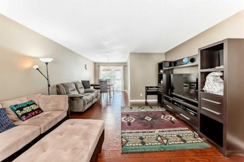 271 Dalhurst Way Nw, Calgary, AB - Indoor Photo Showing Living Room