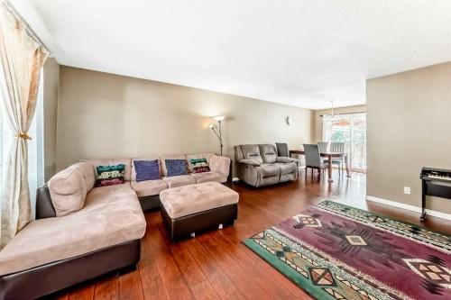 271 Dalhurst Way Nw, Calgary, AB - Indoor Photo Showing Living Room