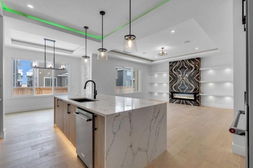 223 Kinniburgh Loop, Chestermere, AB - Indoor Photo Showing Kitchen With Upgraded Kitchen