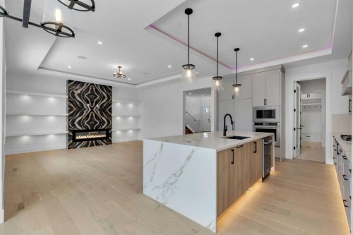 223 Kinniburgh Loop, Chestermere, AB - Indoor Photo Showing Kitchen With Upgraded Kitchen