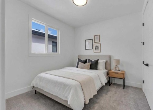 223 Kinniburgh Loop, Chestermere, AB - Indoor Photo Showing Bedroom