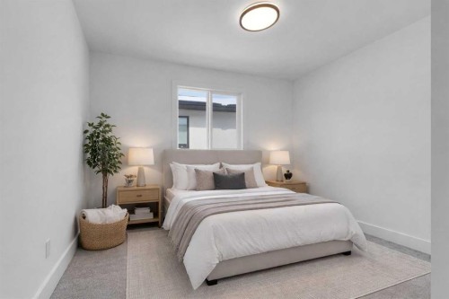 223 Kinniburgh Loop, Chestermere, AB - Indoor Photo Showing Bedroom