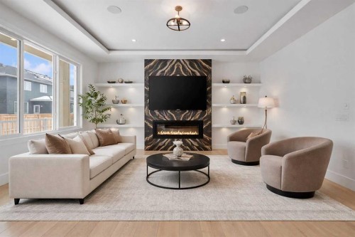 223 Kinniburgh Loop, Chestermere, AB - Indoor Photo Showing Living Room